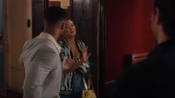 Vivienne Westwood Baby Printed Canvas Utility Small Bag worn by Mindy Chen (Ashley Park) as seen in Emily in Paris (S05E03)