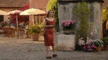 Gianvito Rossi Daniah 85 Applique Crepe Satin Mules worn by Sylvie Grateau (Philippine Leroy-Beaulieu) as seen in Emily in Paris (S05E04)