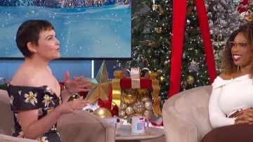 Emilia Wickstead Souline Festive Lilies Peplum Top worn by Ginnifer Goodwin as seen in The Jennifer Hudson Show on December 11, 2025