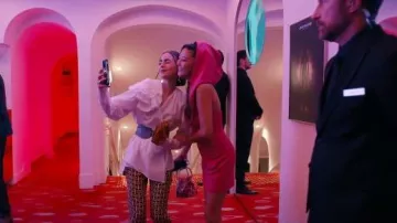 Jimmy Choo Bon Bon Floral Sequin Satin Clutch Bag worn by Mindy Chen (Ashley Park) as seen in Emily in Paris (S05E05)