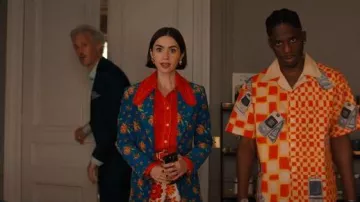 Ganni Ruffle Trimmed Cotton Poplin Shirt worn by Emily Cooper (Lily Collins) as seen in Emily in Paris (S05E05)