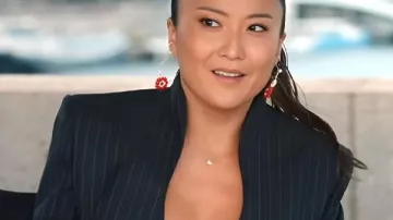 Emily In Paris S05 Ashley Park Black Pinstriped Blazer worn by Mindy Chen (Ashley Park) as seen in Emily in Paris (S05)