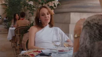 Alaïa Asym Ray Wool Asymmetric Midi Dress worn by Sylvie Grateau (Philippine Leroy-Beaulieu) as seen in Emily in Paris (S05E07)