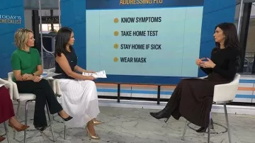 Reiss Ava Pleated Midi Skirt worn by Natalie Azar as seen in Today on December 23, 2025