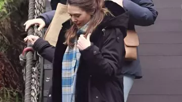 Eternity 2025 Elizabeth Olsen Black Hooded Coat worn by Joan (Elizabeth Olsen) in Eternity