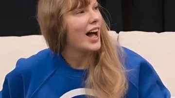 Taylor Swift The End of an Era Taylor Swift Blue Sweatshirt worn by Self (Taylor Swift) as seen in Taylor Swift | The Eras Tour | The End of an Era (S01E03)