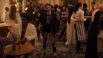 Valentino Garavani Leather Patchwork Studded Knee High Boots worn by Emily Cooper (Lily Collins) as seen in Emily in Paris (S05E08)