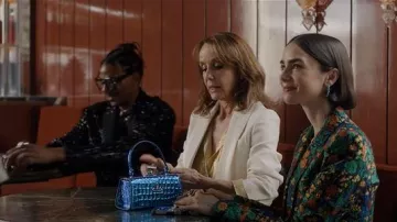 Vivienne Westwood Doll Xl Bag Iridescent Croc in Blue worn by Emily Cooper (Lily Collins) as seen in Emily in Paris (S05E08)