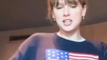 Taylor Swift USA Flag Sweater worn by Self (Taylor Swift) as seen in Taylor Swift | The Eras Tour | The End of an Era (S01E01)