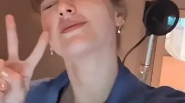 Taylor Swift The End Of An Era Blue Shacket worn by Self (Taylor Swift) as seen in Taylor Swift | The Eras Tour | The End of an Era (S01E01)