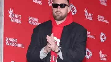 Travis Kelce Broncos VS Chiefs Coat in OMG! Travis Kelce wore Fiancé Taylor Swift's gloves during Chiefs vs Broncos Christmas Day game