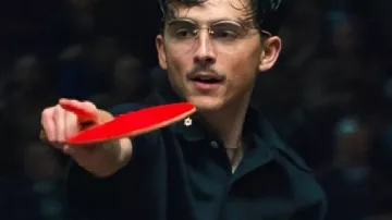 Marty Supreme Timothée Chalamet Polo Shirt worn by Marty (Timothée Chalamet) as seen in Marty Supreme