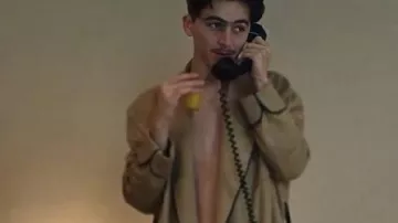 Marty Supreme Timothée Chalamet Beige Coat worn by Marty (Timothée Chalamet) as seen in Marty Supreme