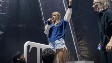 Free People Care FP Would U Rather Tee worn by Taylor Swift as seen in Taylor Swift | The Eras Tour | The End of an Era (S01E03)
