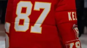 Kansas City Chiefs Taylor Swift Red Puffer Jacket used by Taylor Swift in Taylor Swift's puffy Travis Kelce coat by Kristin Juszczyk gives her stronger tie to Northeast Ohio