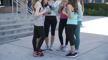 Nike shoes pink in American Housewife