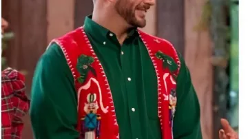 Baked with Love Holiday 2025 Vaughn Vreeland Red Knitted Vest worn by (Vaughn Vreeland) in Baked With Love: Holiday (S01)