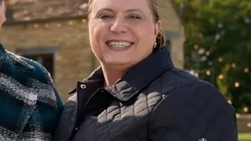 Baked with Love Holiday 2025 Black Quilted Coat as seen in Baked With Love: Holiday (S01E02)