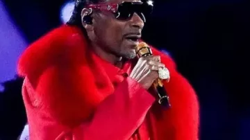 Snoop Dogg Christmas Day 2025 Halftime Show Red Coat in the music video Snoop Dogg Christmas Day FULL Halftime Show (ft. Lainey Wilson & HUNTR/X)