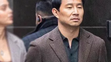 The Copenhagen 2025 Alexander Hale Brown Coat worn by Alexander Hale (Simu Liu) as seen in The Copenhagen Test (S01)