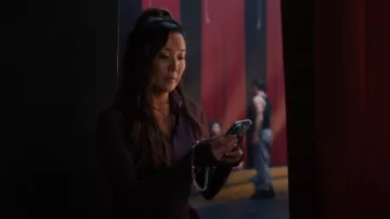 String Ting Beary Pastel Drip Wristlet Phone Strap worn by Mindy Chen (Ashley Park) as seen in Emily in Paris (S05E03)