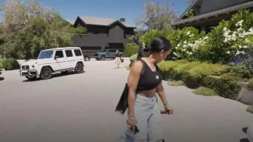 Loewe Anagram Cropped Cotton-blend Tank Top worn by Malika Haqq as seen in The Kardashians (S07E10)
