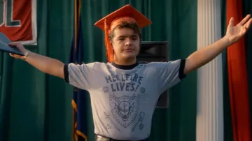Hellfire Lives Ringer T-Shirt worn by Dustin Henderson (Gaten Matarazzo) in Stranger Things (S05E08)
