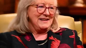 The Traitors US S04 Donna Kelce Black/Red Floral Blazer as seen in The Traitors (S04E01)