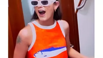 Below Deck Mediterranean S10 Aesha Scott Orange Fish Printed Dress worn by (Aesha Scott) in Below Deck Mediterranean