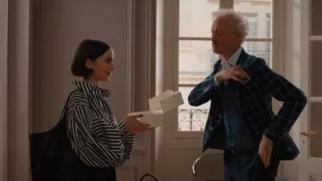 Tod’s T Timeless Medium Laser Cut Leather Tote Bag worn by Emily Cooper (Lily Collins) as seen in Emily in Paris (S05E06)