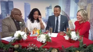 Banana Republic Fuzzy Alpaca-Blend Puff-Sleeve Sweater worn by Sheinelle Jones as seen in Today on January 2, 2026