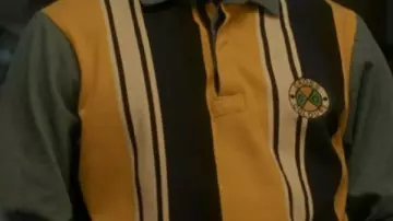 Striped Polo Top worn by Lucas Sinclair (Caleb McLaughlin) in Stranger Things: The Rightside Up