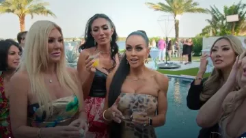 Steve Madden Faux Leather Chain Strap Bodysuit worn by Ro-mina Ustayev as seen in Members Only: Palm Beach (S01E02)