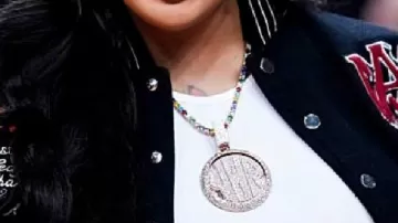 Black Varsity Jacket worn by GloRilla in Lil Durk shocks everyone after He got diamonds testing ???????? (via @JawaunFord)