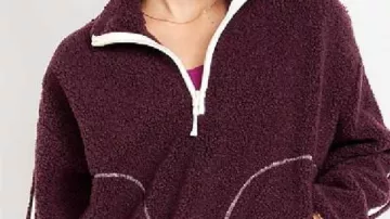 Abbott Elementary S05 Janine Teagues Burgundy Sherpa Jacket worn by Janine Teagues (Quinta Brunson) in Abbott Elementary (S05)