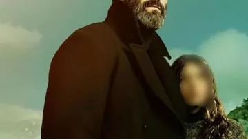 Abri Jason Statham Manteau noir porté par Mason (Jason Statham) dans l’abri