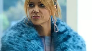 High Potential S02 Kaitlin Olson Blue Leopard Faux Fur Coat worn by Morgan Gillory (Kaitlin Olson) as seen in High Potential (S02E03)