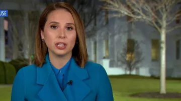 Reiss Agnes Long Belted Coat worn by Elizabeth Schulze as seen in Good Morning America on January 12, 2026