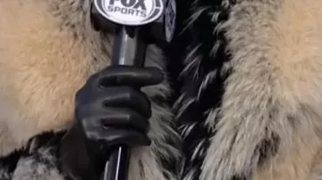 Fur Jacket worn by Erin Andrews in Erin Andrews Steals the Show: $950 FOX JACKET Shocks NFL Fans