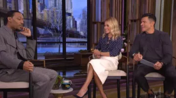 Miu Miu Polka-Dot Silk Scarf-Neck Shirt worn by Kelly Ripa as seen in LIVE with Kelly and Mark on January 13, 2026