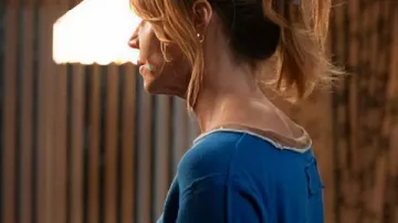 High Potential S02 Kaitlin Olson Blue Flower Sleeves Sweater worn by Morgan Gillory (Kaitlin Olson) as seen in High Potential (S02)