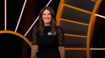 Sandro Top Black Lace & Embroidered Accents Short Sleeve worn by (D'Arcy Carden) as seen in Celebrity Wheel of Fortune (S06E09)