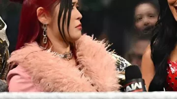 Iyo Sky Raw 2026 Pink Fur Trim Jacket as seen in WWE Raw