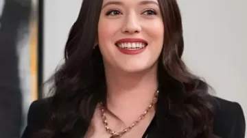 Shifting Gears S02 Kat Dennings Black Floral Blazer worn by Riley Parker (Kat Dennings) as seen in Shifting Gears (S02)