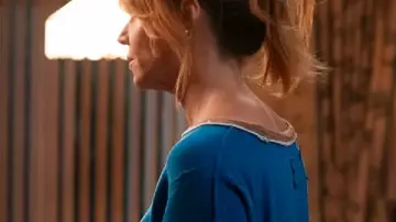 High Potential S02 Kaitlin Olson Floral Sleeves Blue Sweater worn by Morgan Gillory (Kaitlin Olson) as seen in High Potential (S02)