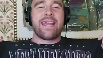 Travis Kelce Black New Heights Graphic T-Shirt in Paul Rudd on Why Jack Black is The Best, Worst Auditions, Chiefs Fandom & Naming Your Nuts | EP 171
