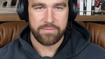 New Heights Black Horse Printed Hoodie worn by (Travis Kelce) as seen in New Heights