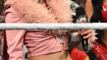 Pink Fur Trim Leather Jacket worn by Iyo Sky in Rhea ripley & iyo sky unboxing labubu ???? #shorts #wwe #rhearipley