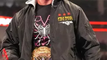 WWE CM Punk Black Hooded Bomber Jacket worn by CM Punk (CM Punk) in WWE Raw on Netflix Premier Post-Show