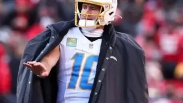 Justin Herbert LA Chargers Cape Coat in Mic'd Up: Justin Herbert At Camp "Insert Fortnite Emote" | LA Chargers